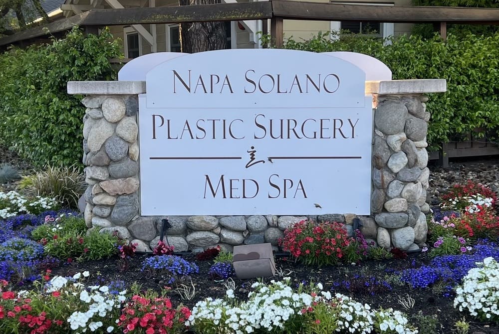 New-Front-sign-with-FLowers Outside sign with flowers in front